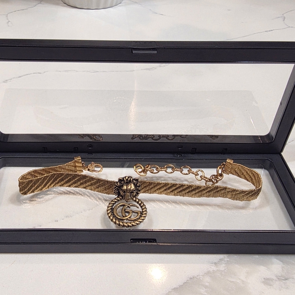 Gucci Lion Head gold-toned choker necklace with an antiqued finish